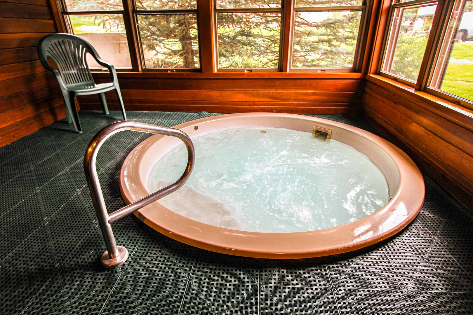 A cozy indoor Jacuzzi tub at VRI's Sunburst Resort in Steamboat Springs, Colorado.